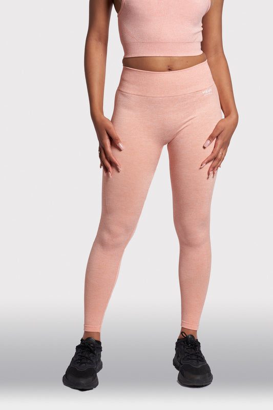 front view of peach gym leggings