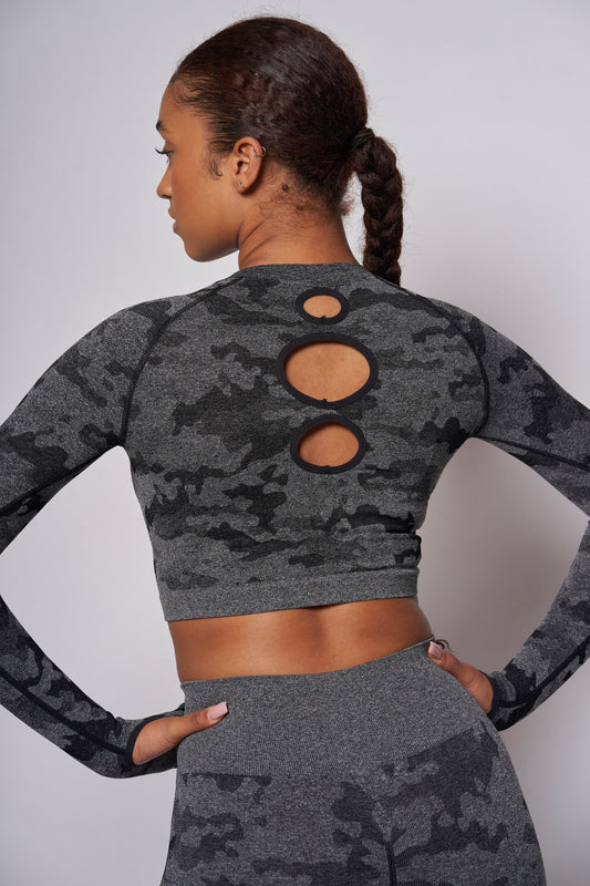 back view of girl wearing grey camouflage gymwear